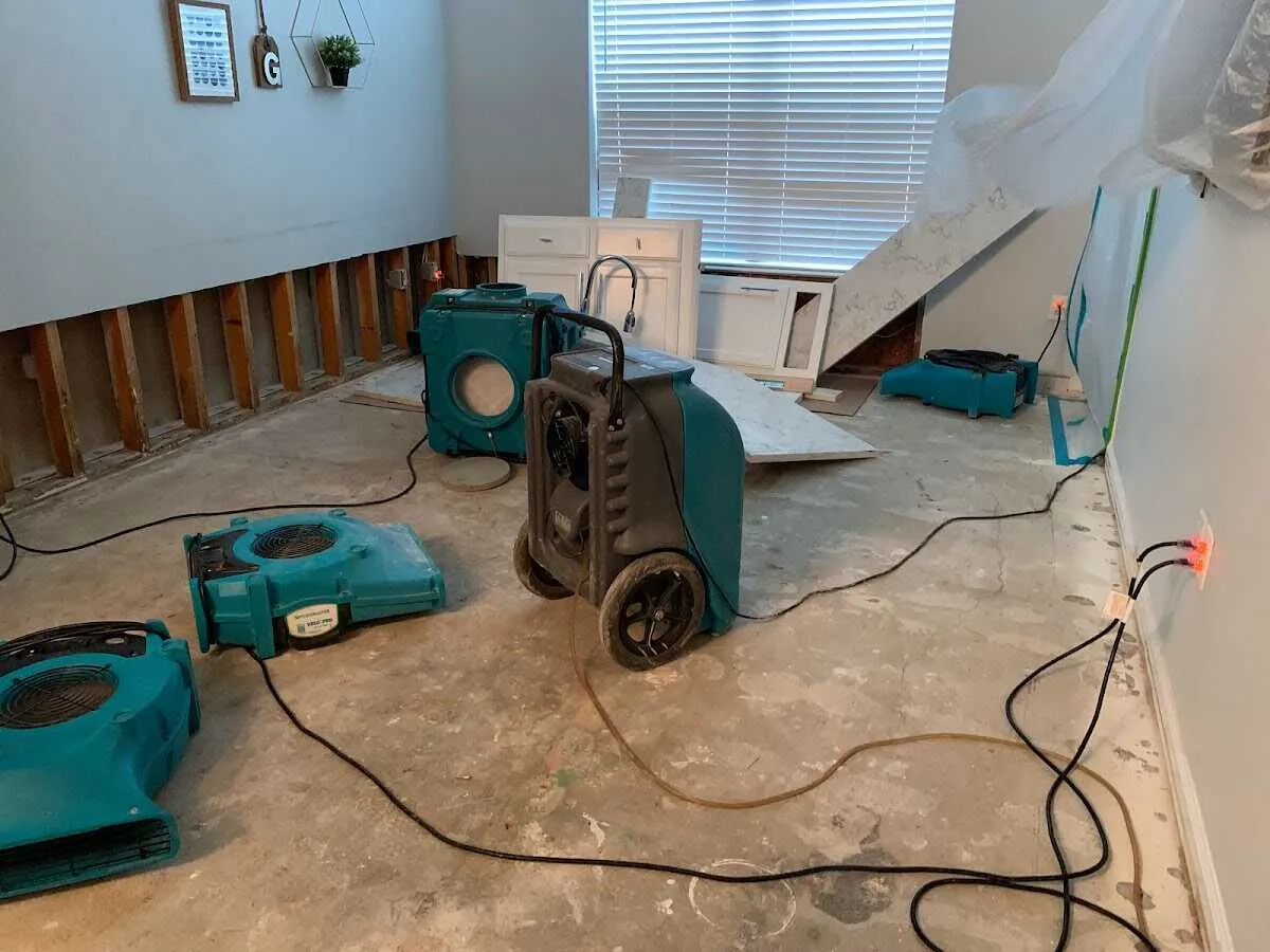 Dehumidifier in flood-cut room for Water Damage Restoration in Laketown